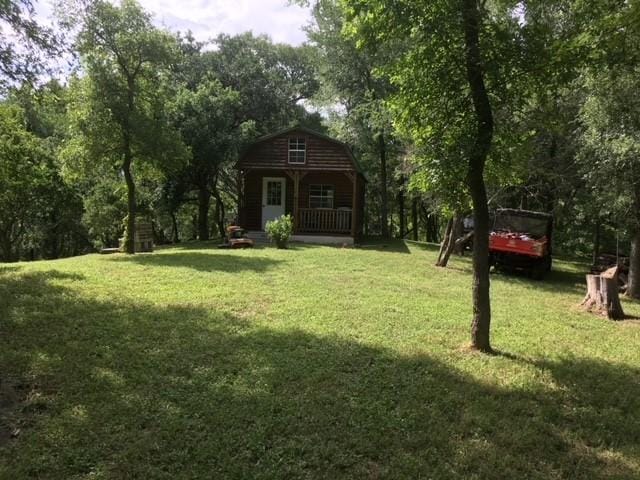 view of yard featuring a porch