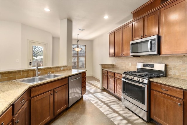 kitchen with a sink, stainless steel appliances, backsplash, and finished concrete flooring