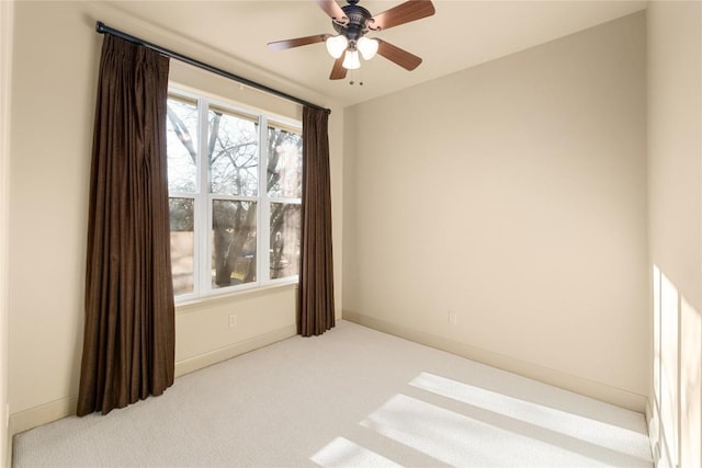 5603 Clay Ave Unit B, Austin, TX 78756 - spare room featuring carpet floors, a ceiling fan, and baseboards