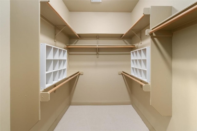 5603 Clay Ave Unit B, Austin, TX 78756 - walk in closet featuring carpet floors