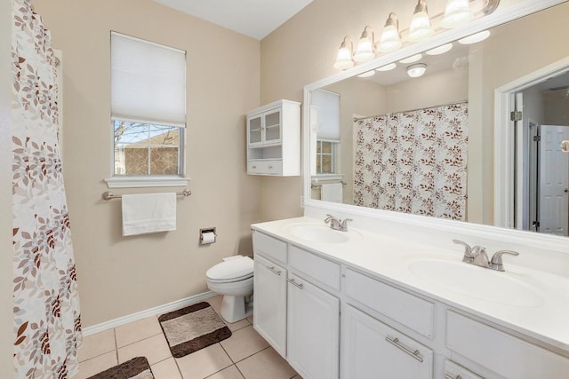 full bathroom with toilet, double vanity, tile patterned flooring, and baseboards