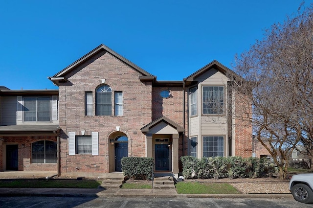 multi unit property featuring brick siding