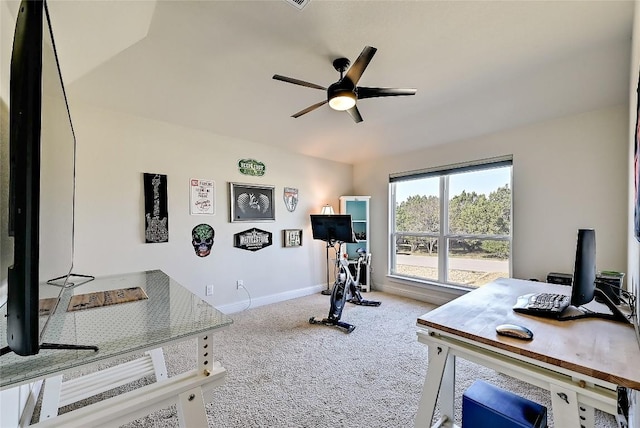 workout room with baseboards, carpet floors, and ceiling fan