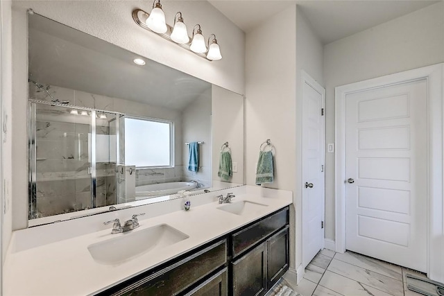 bathroom with a shower stall, a bath, marble finish floor, and a sink