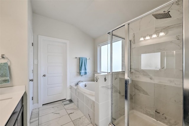 full bathroom with a shower stall, a garden tub, marble finish floor, and lofted ceiling