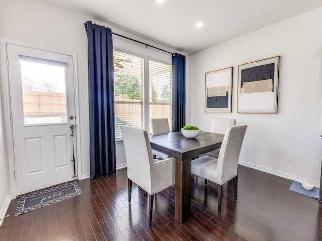 dining space with recessed lighting, baseboards, and dark wood-style floors