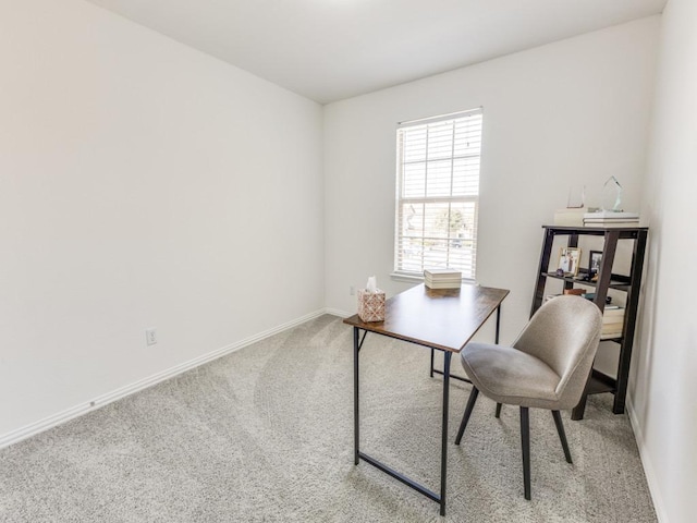 office area featuring carpet and baseboards