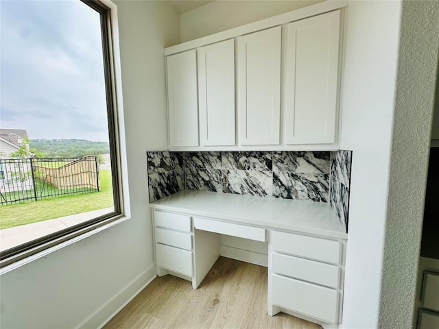 1670 Headwaters Blvd, Dripping Springs, TX 78620 - unfurnished office featuring light wood-style floors and baseboards