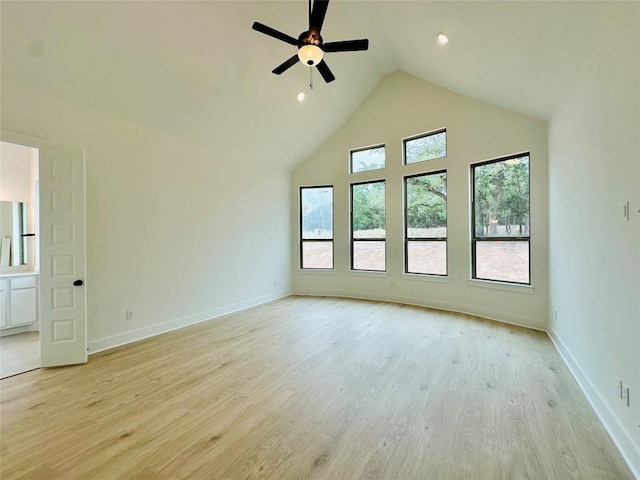 1670 Headwaters Blvd, Dripping Springs, TX 78620 - spare room with baseboards, ceiling fan, high vaulted ceiling, light wood-style flooring, and recessed lighting