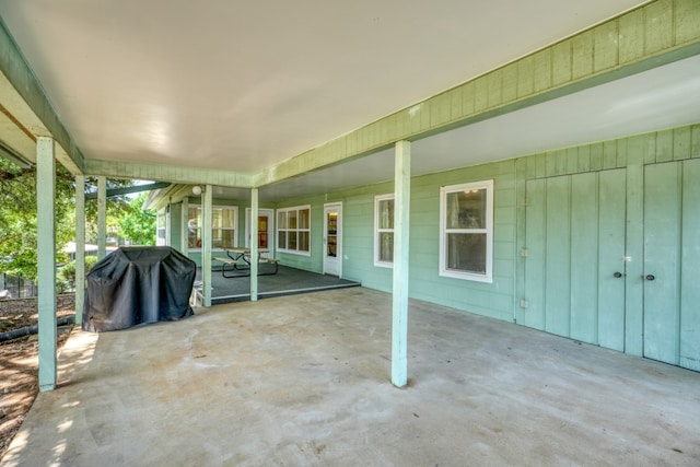 view of patio featuring a grill