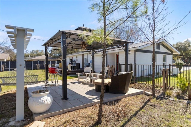 view of patio / terrace with a gazebo and fence