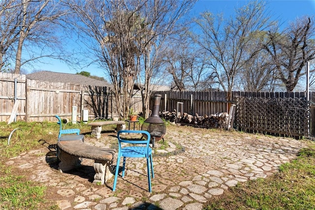 view of yard with a fenced backyard