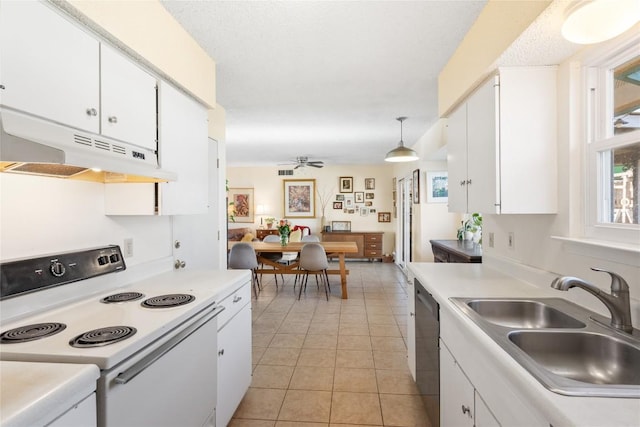 kitchen with under cabinet range hood, light tile patterned floors, white electric range oven, white cabinetry, and a sink