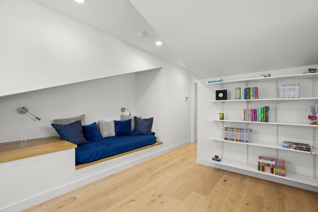 sitting room featuring recessed lighting, baseboards, wood-type flooring, and vaulted ceiling