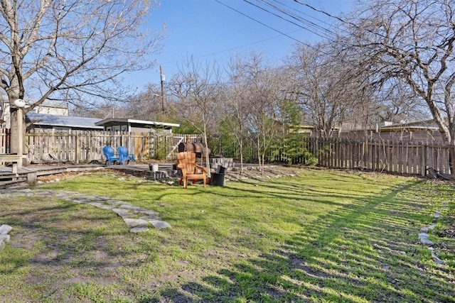 view of yard featuring a fenced backyard