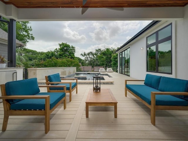 wooden deck with outdoor lounge area