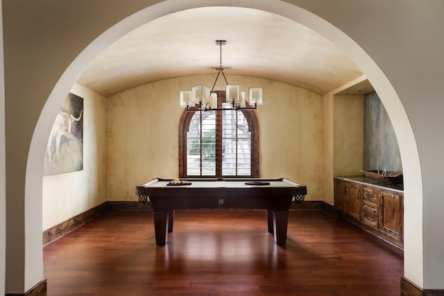 game room with pool table, dark wood-type flooring, baseboards, and vaulted ceiling