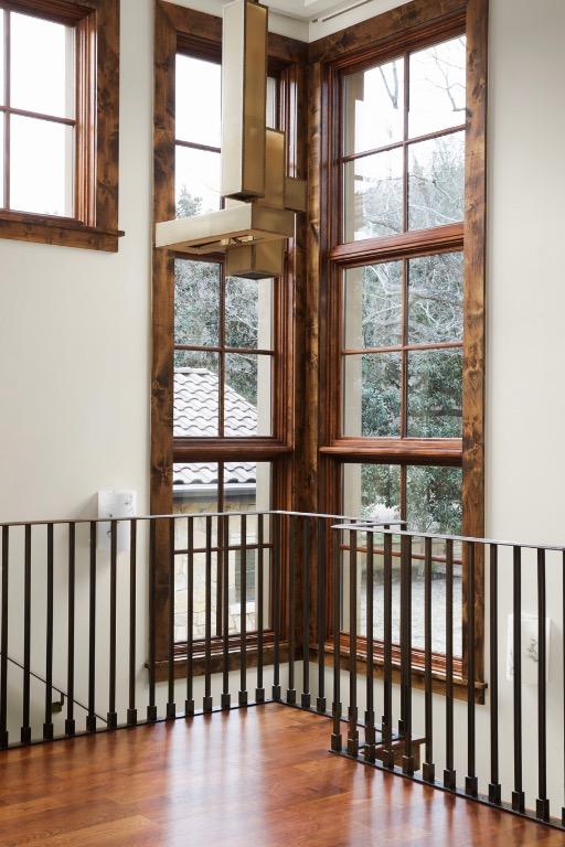 interior space featuring plenty of natural light and wood finished floors