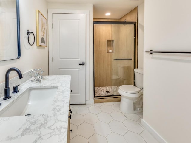 1107 Lincoln St, Austin, TX 78702 - full bath with a shower stall, tile patterned floors, double vanity, and toilet