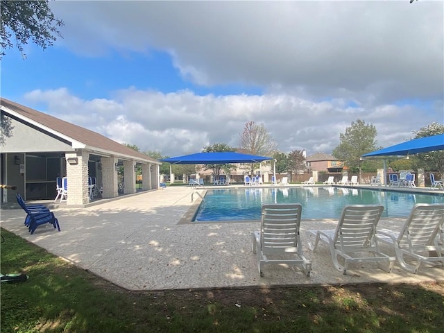 pool with a patio