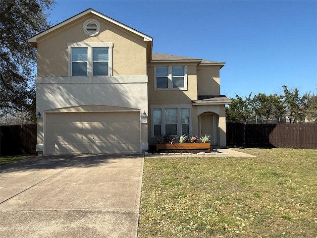 traditional home featuring fence, driveway, an attached garage, stucco siding, and a front lawn