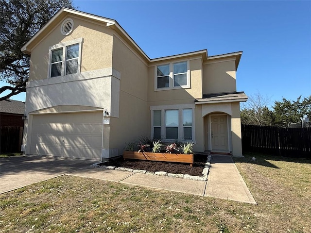 traditional-style house with stucco siding, a garage, concrete driveway, and fence