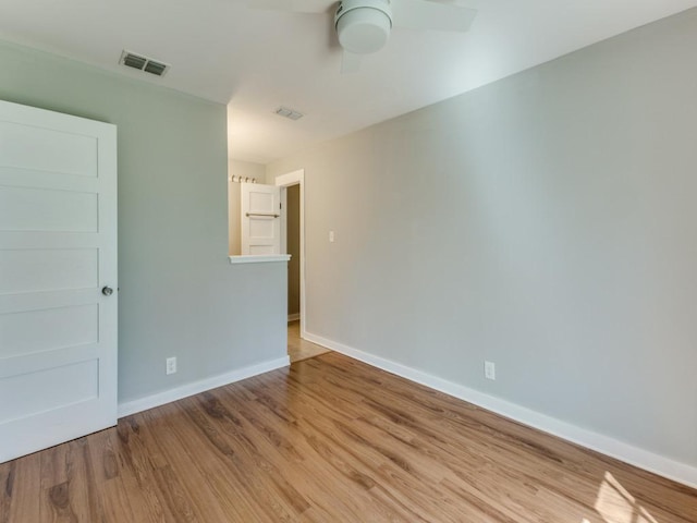 1105 Brookswood Ave, Austin, TX 78721 - spare room with a ceiling fan and light wood-style floors