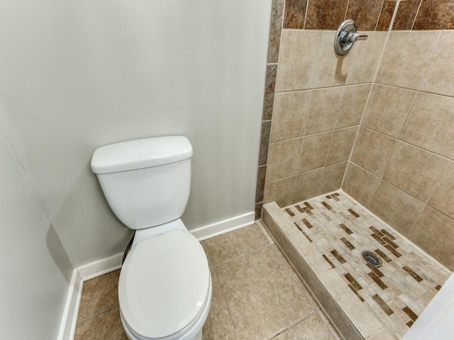 1105 Brookswood Ave, Austin, TX 78721 - full bathroom with a tile shower and tile patterned floors
