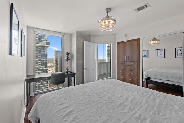 bedroom featuring visible vents