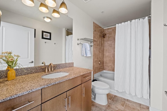 full bath featuring vanity, tile patterned floors, toilet, and shower / bathtub combination with curtain