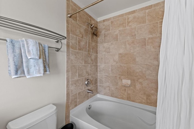 full bathroom featuring toilet and shower / bath combo with shower curtain