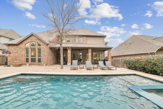 view of pool with a patio area, a fenced in pool, and a fenced backyard