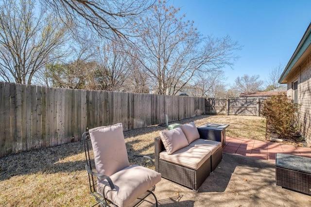 view of patio / terrace with an outdoor living space and a fenced backyard