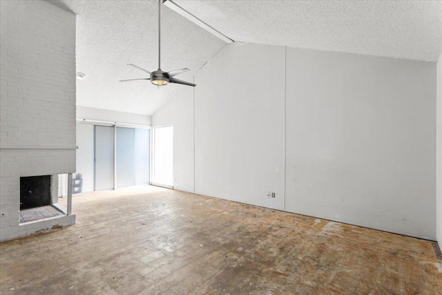 unfurnished living room featuring a textured ceiling, a brick fireplace, ceiling fan, and high vaulted ceiling