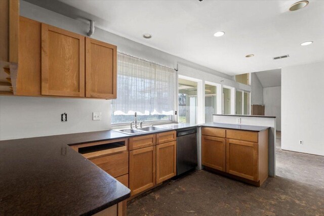 kitchen with brown cabinetry, a peninsula, recessed lighting, a sink, and dishwasher