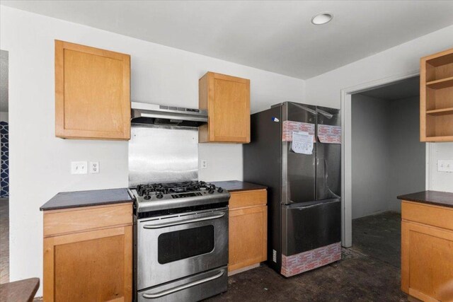 kitchen with concrete floors, open shelves, stainless steel appliances, extractor fan, and dark countertops