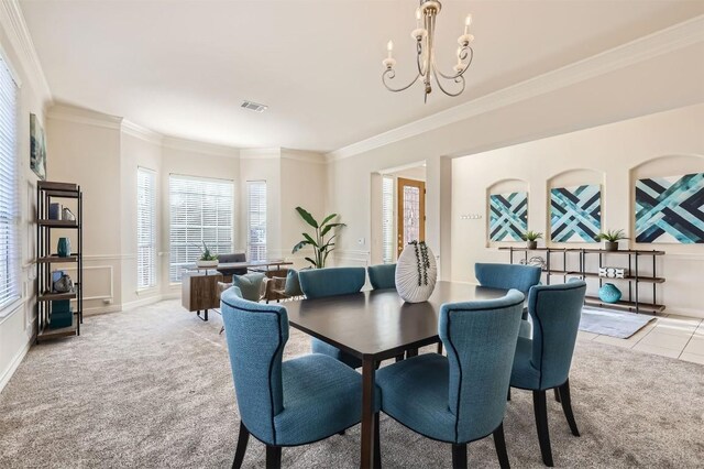 tiled dining area featuring visible vents, an inviting chandelier, carpet, and ornamental molding