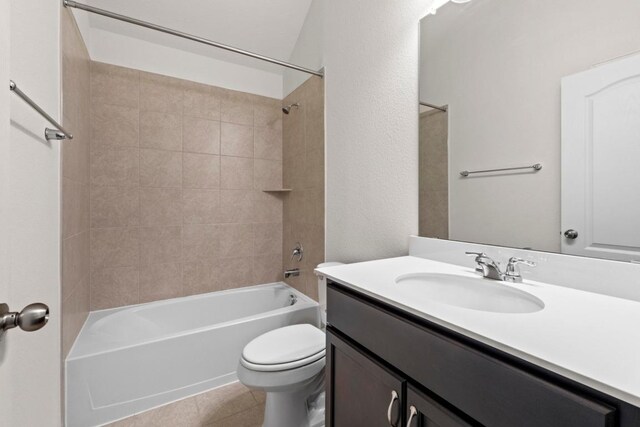 full bath with vanity, toilet, tile patterned flooring, and shower / bath combination