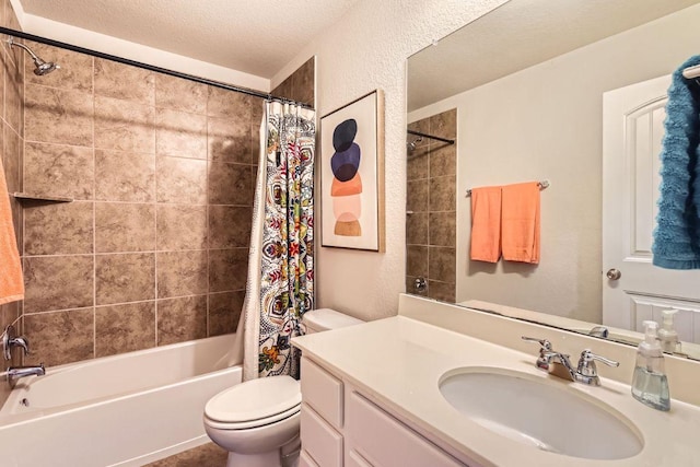 full bathroom featuring shower / bath combo with shower curtain, toilet, a textured ceiling, vanity, and a textured wall