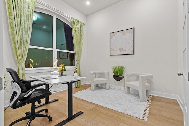 office area featuring recessed lighting, wood finished floors, and baseboards