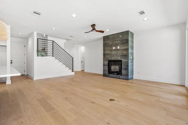 unfurnished living room featuring recessed lighting, light wood-style floors, and visible vents