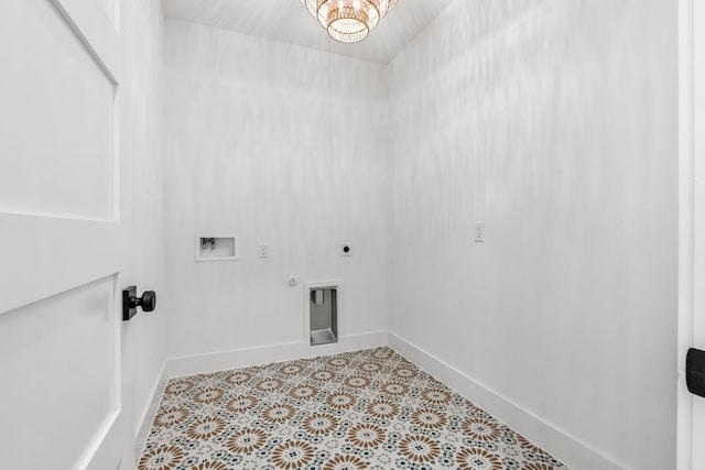 laundry room featuring hookup for a washing machine, baseboards, gas dryer hookup, laundry area, and electric dryer hookup