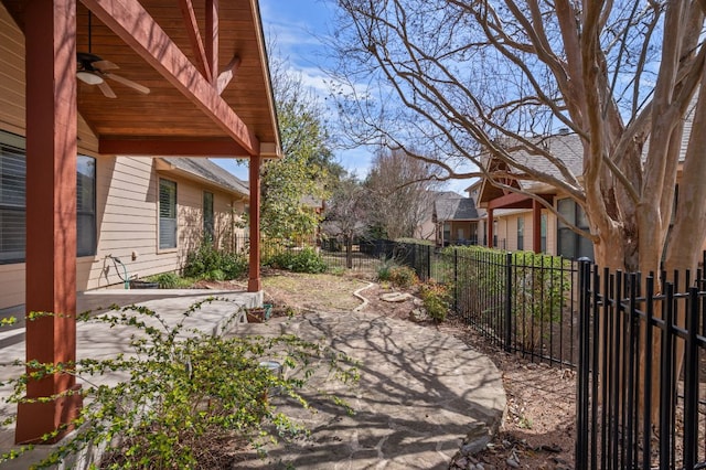 view of patio featuring a ceiling fan and a fenced backyard