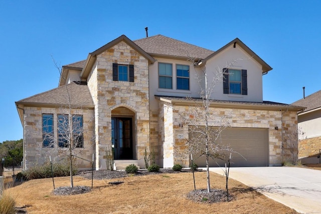 view of front facade featuring stucco siding, stone siding, concrete driveway, an attached garage, and a shingled roof