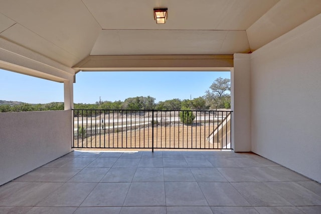 view of patio featuring a balcony