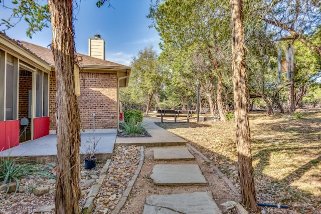 view of yard with a patio area