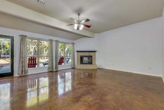 unfurnished living room with visible vents, beam ceiling, a ceiling fan, a fireplace, and baseboards