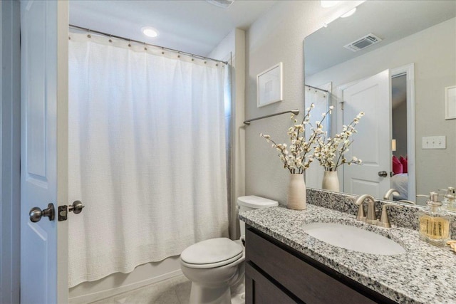 bathroom with visible vents, shower / tub combo, toilet, and vanity