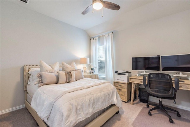 carpeted bedroom featuring baseboards, ceiling fan, and vaulted ceiling