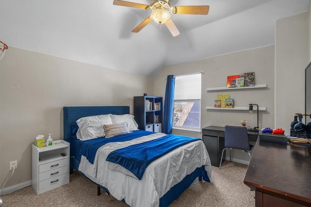 bedroom with baseboards, lofted ceiling, carpet floors, and a ceiling fan